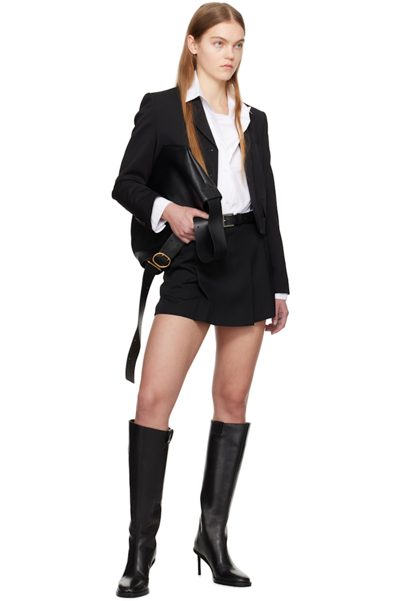 Polyester- and wool-blend barathea blazer.

· Notched lapel
· Button closure
· Welt pocket and flap pockets
· Cropped hem
· Padded shoulders
· Four-button surgeon's cuffs
· Full satin lining

Supplier color: Black