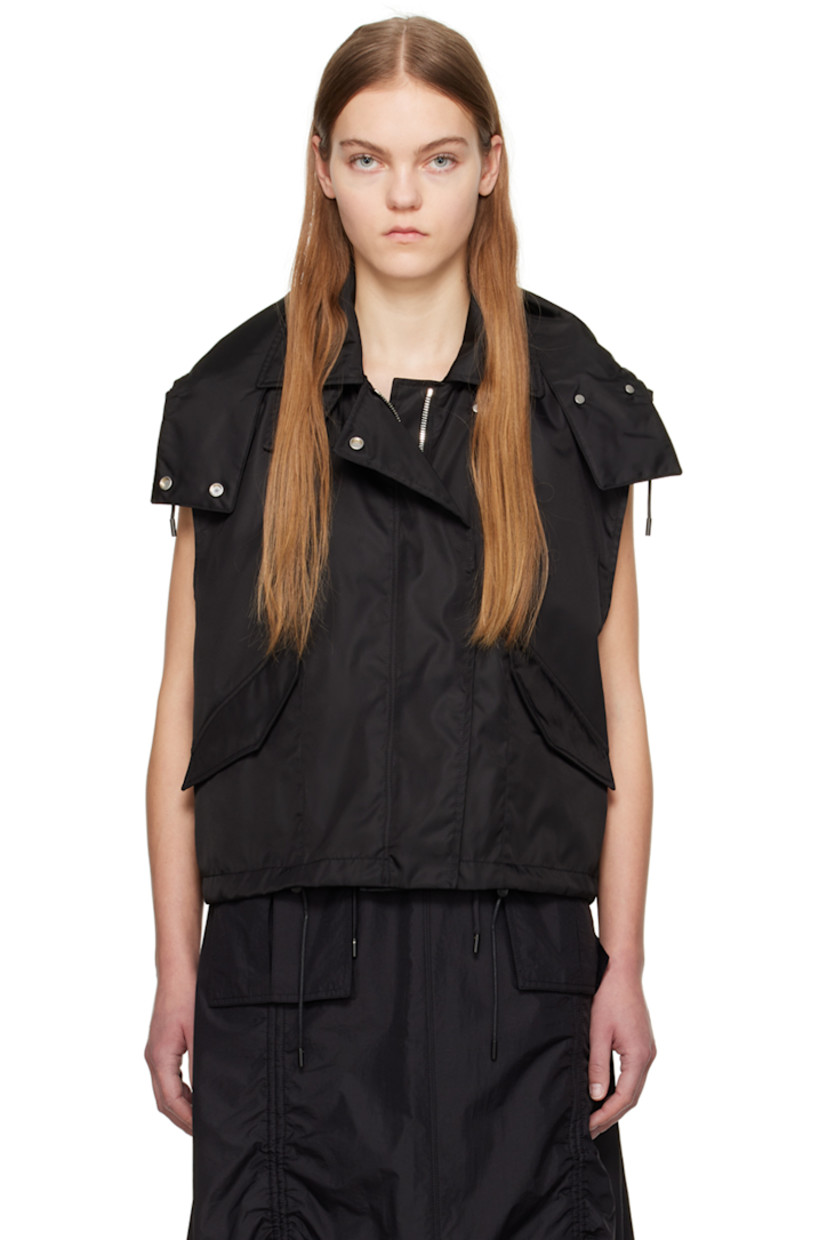 Nylon taffeta vest.

· Cord-lock drawstring at detachable hood 
· Throat guard at spread collar 
· Two-way zip closure with press-stud placket
· Flap pockets 
· Cord-lock drawstring at hem 
· Full satin lining

Supplier color: Black