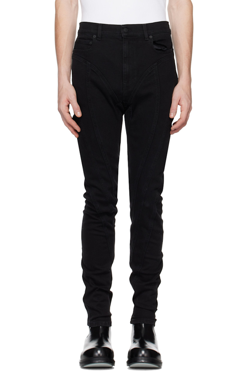 Slim-fit stretch denim jeans.  

· Paneled construction
· Belt loops
· Five-pocket styling
· Zip-fly
· Leather logo patch at back waistband
· Contrast stitching in tan

Supplier color: Black