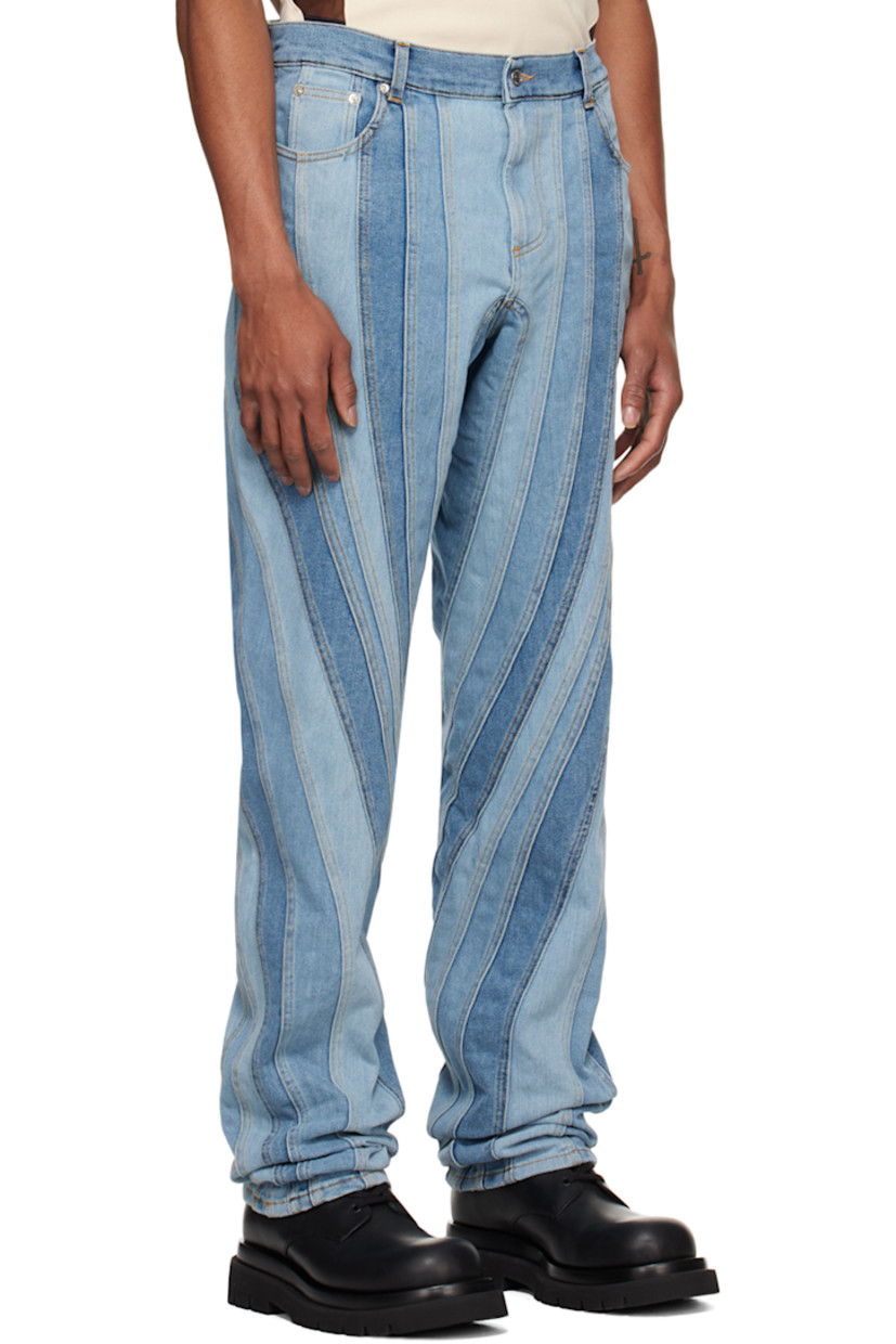 Baggy-fit stretch denim jeans. Fading throughout.

· Paneled construction
· Low rise
· Belt loops
· Five-pocket styling
· Zip-fly
· Leather logo patch at back waistband
· Logo-engraved silver-tone hardware
· Contrast stitching in tan

Supplier color: Medium blue