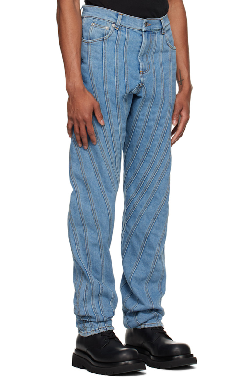 Baggy-fit stretch denim jeans. Fading throughout.

· Paneled construction
· Low rise
· Belt loops
· Five-pocket styling
· Zip-fly
· Leather logo patch at back waistband
· Logo-engraved silver-tone hardware
· Contrast stitching in tan

Supplier color: Medium blue