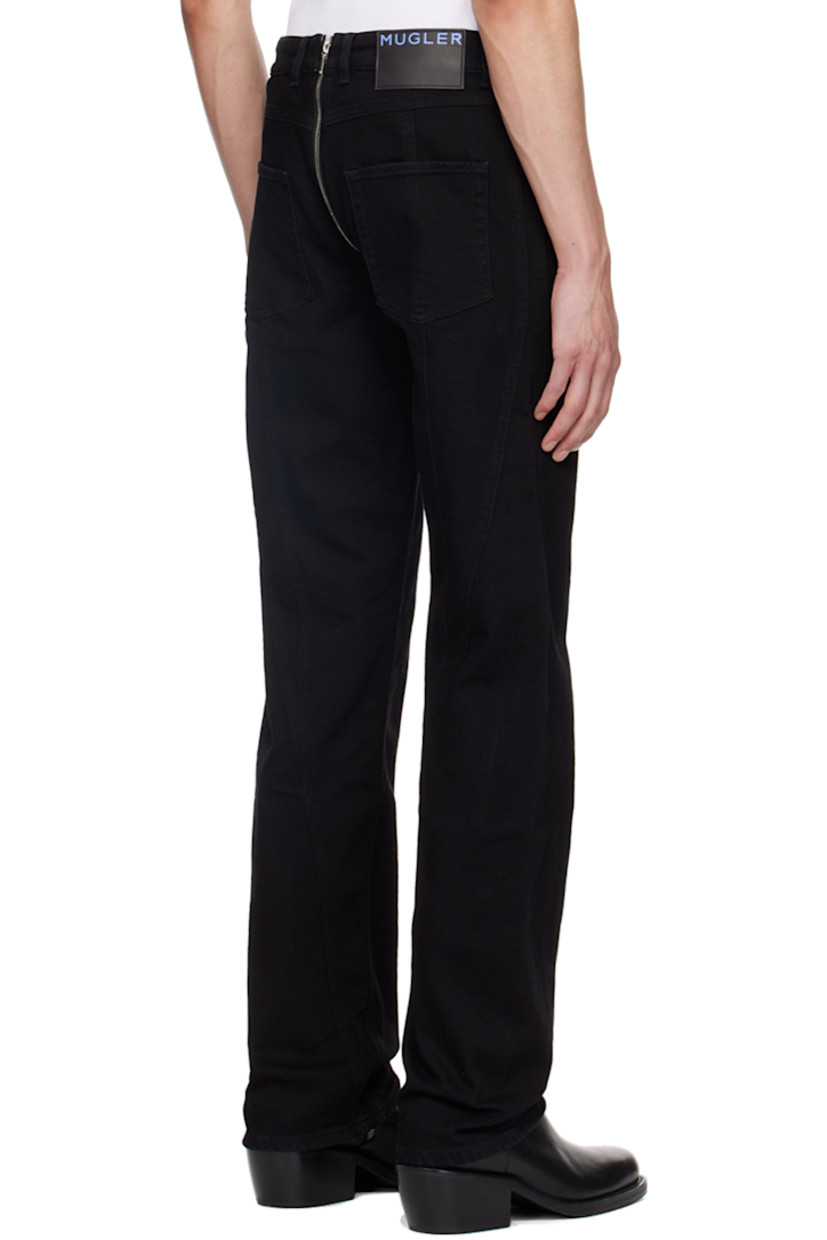 Stretch denim jeans.

· Belt loops
· Five-pocket styling
· Two-way zip-fly extends to back waistband
· Central seam at legs
· Twisted outseams
· Logo patch at back waistband

Supplier color: Black