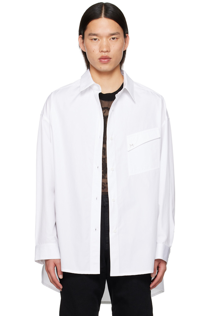 Cotton poplin shirt.

· Spread collar
· Button closure
· Logo hardware at flap pocket
· Droptail hem
· Dropped shoulders
· Single-button barrel cuffs

Supplier color: Blanc optique