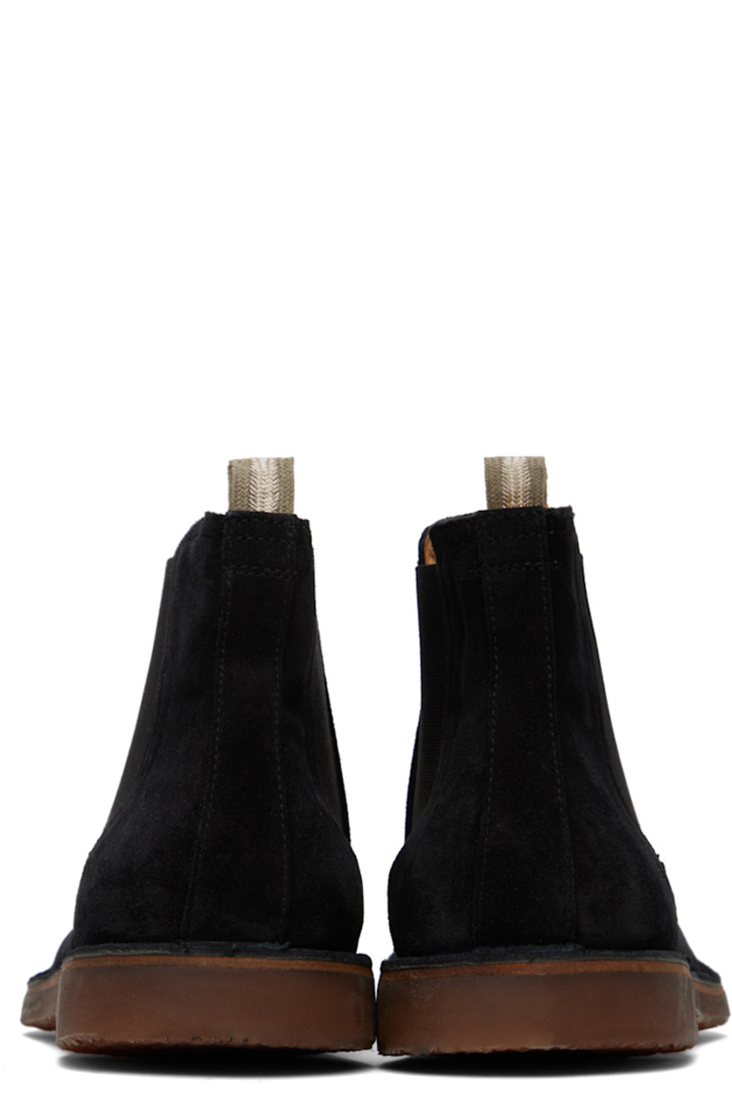 Ankle-high handcrafted suede Chelsea boots in black. 

· Elasticized gusset at sides
· Pull-loop at heel counter
· Buffed leather lining
· Crepe rubber sole

Supplier color: Nero