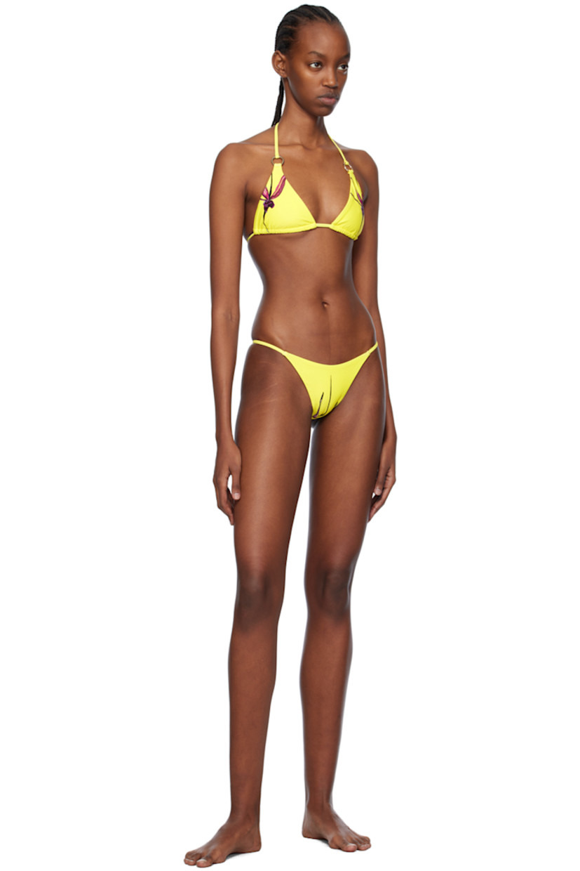 Stretch recycled polyester jersey bikini bottoms. Graphic pattern printed throughout.

· Elasticized waistband
· Full jersey lining

Supplier color: Caledenia orchi