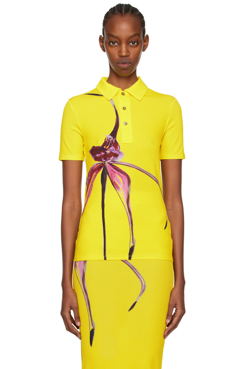 Stretch cupro ribbed jersey polo. Graphic pattern printed throughout.

· Spread collar
· Three-button placket

Supplier color: Caledonia orchid