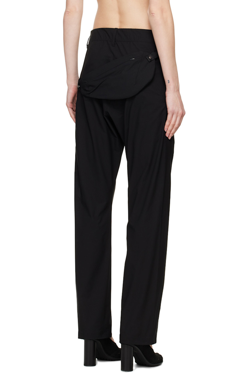 Flared water-resistant plain-woven polyester and stretch nylon trousers. 

· Belt loops at partially-elasticized waistband
· Two-pocket styling
· Zip-fly
· YKK CONCEAL® zip pockets at front
· Detachable zip pouch at back
· Patch pocket with COBRAX closure at interior

Part of the 6.0 collection.

Supplier color: Black