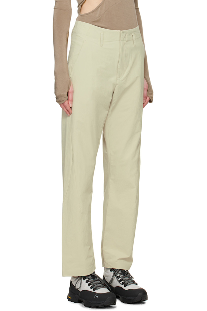 Stretch nylon crepe trousers. Water-repellent and durable. 

· Paneled construction
· Belt loops
· Three-pocket styling 
· Zip-fly
· Zip pocket at leg 

Part of the 6.0 collection.

Supplier color: Ivory
