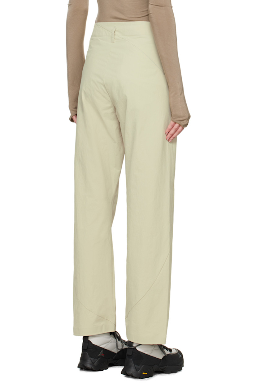 Stretch nylon crepe trousers. Water-repellent and durable. 

· Paneled construction
· Belt loops
· Three-pocket styling 
· Zip-fly
· Zip pocket at leg 

Part of the 6.0 collection.

Supplier color: Ivory