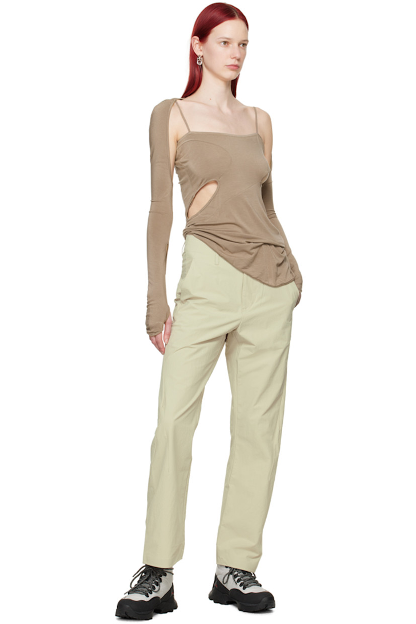 Stretch nylon crepe trousers. Water-repellent and durable. 

· Paneled construction
· Belt loops
· Three-pocket styling 
· Zip-fly
· Zip pocket at leg 

Part of the 6.0 collection.

Supplier color: Ivory