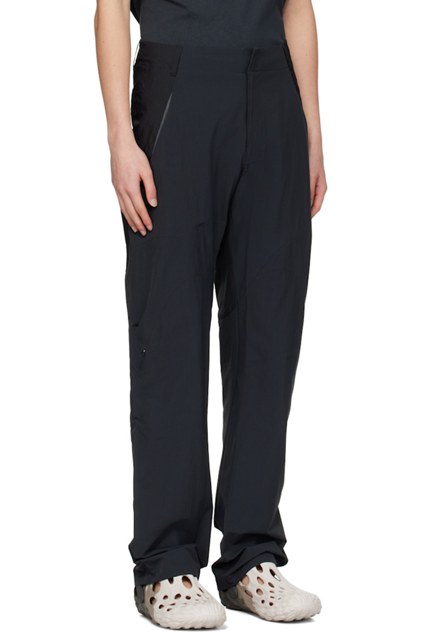 Water-repellent crinkled stretch nylon taffeta trousers.

· Paneled construction
· Belt loops
· Four-pocket styling
· EXCELLA® zip-fly
· CONCEAL® zip pockets at outseams

Part of the 6.0 collection.

Supplier color: Black