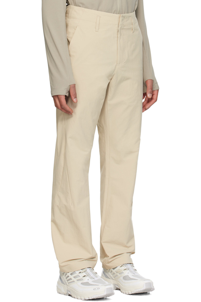 Flared durable water-repellent stretch nylon taffeta trousers.

· Belt loops
· Three-pocket styling
· Zip-fly 
· Concealed zip pockets at front 

Part of the 6.0 collection.

Supplier color: Ivory