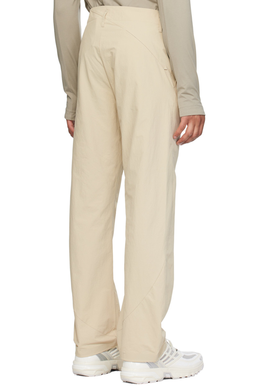 Flared durable water-repellent stretch nylon taffeta trousers.

· Belt loops
· Three-pocket styling
· Zip-fly 
· Concealed zip pockets at front 

Part of the 6.0 collection.

Supplier color: Ivory