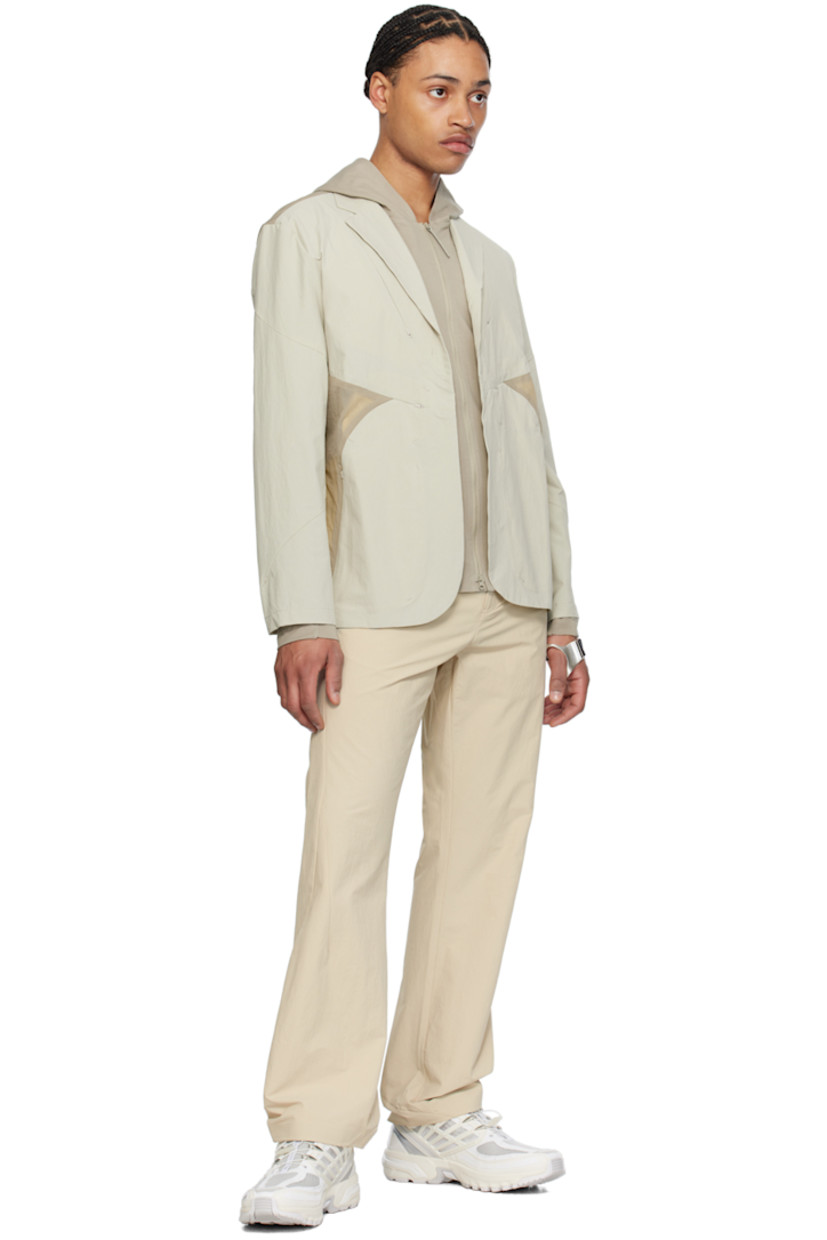 Flared durable water-repellent stretch nylon taffeta trousers.

· Belt loops
· Three-pocket styling
· Zip-fly 
· Concealed zip pockets at front 

Part of the 6.0 collection.

Supplier color: Ivory