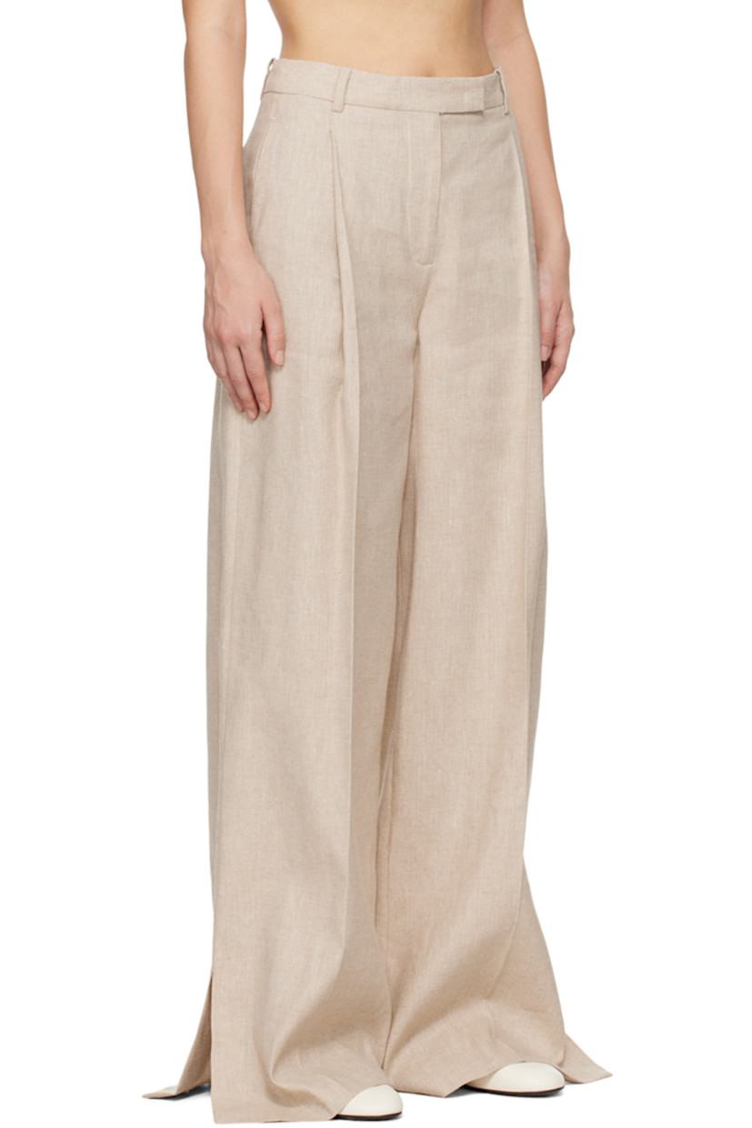 Linen- and cotton-blend hopsack trousers.

· Belt loops
· Three-pocket styling
· Zip-fly
· Pleats at front 
· Vented cuffs

Supplier color: Linen