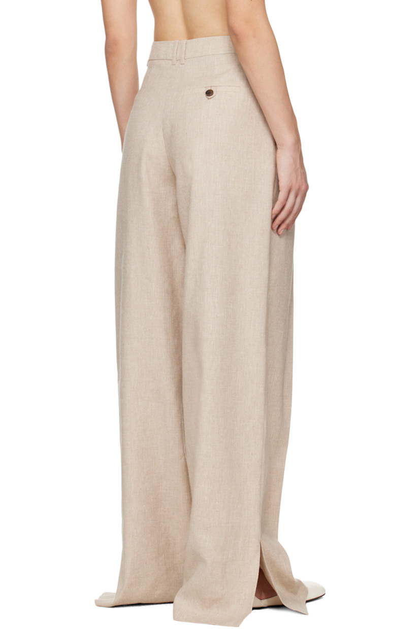 Linen- and cotton-blend hopsack trousers.

· Belt loops
· Three-pocket styling
· Zip-fly
· Pleats at front 
· Vented cuffs

Supplier color: Linen