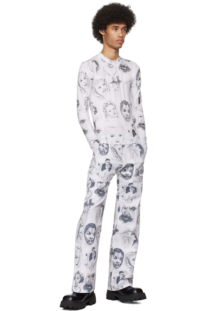 Lightweight stretch polyester jersey T-shirt. Graphic pattern printed throughout.

· Crewneck
· Elasticized finger loop at cuffs

Supplier color: Fan art