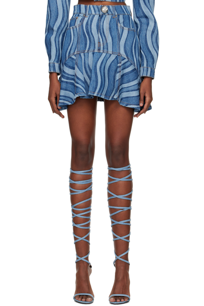 Non-stretch denim skirt. Stripes throughout. 

· Paneled construction
· Belt loops
· Three-pocket styling
· Zip-fly
· Ruffles at flared hem
· Logo-engraved brass-tone hardware
· Contrast stitching in tan

Supplier color: Indigo multi