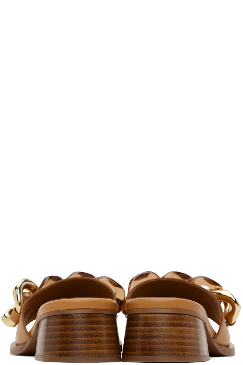 Buffed calfskin slip-on heeled sandals in tan.

· Open toe
· Plexiglass curb chain at vamp
· Logo embossed at padded calfskin footbed
· Stacked leather block heel with rubber injection
· Leather sole with rubber injection
· Logo-engraved gold-tone hardware
· Heel: H1.5"

Supplier color: Tan