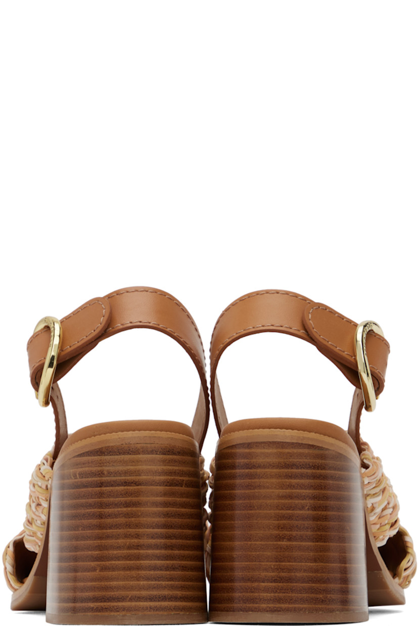 Woven faux-leather heeled sandals in tones of beige. 

· Open toe
· Braided crisscrossing straps at vamp
· Pin-buckle ankle strap
· Logo embossed at padded calfskin footbed
· Stacked leather block heel with rubber injection
· Treaded rubber sole
· Logo-engraved gold-tone hardware
· Heel: H3.25"

Supplier color: Assorted