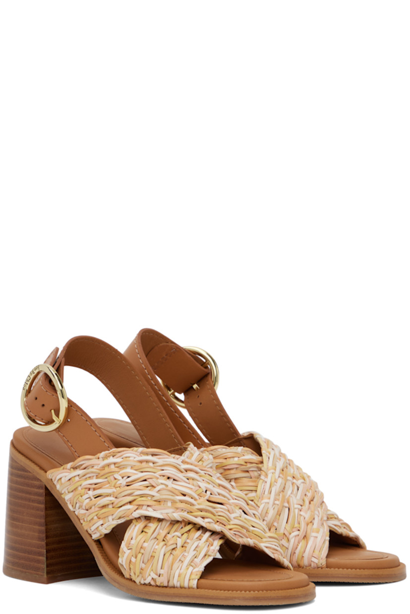 Woven faux-leather heeled sandals in tones of beige. 

· Open toe
· Braided crisscrossing straps at vamp
· Pin-buckle ankle strap
· Logo embossed at padded calfskin footbed
· Stacked leather block heel with rubber injection
· Treaded rubber sole
· Logo-engraved gold-tone hardware
· Heel: H3.25"

Supplier color: Assorted