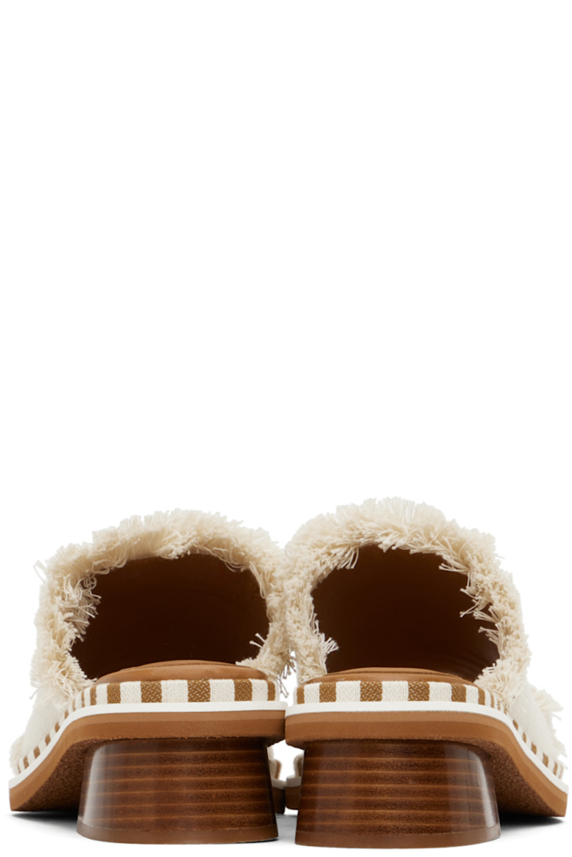 Fringed canvas slip-on heeled sandals in off-white. 

· Open toe
· Logo embossed at molded calfskin footbed
· Striped canvas trim at welt
· Stacked leather heel with rubber injection
· Crepe rubber sole

Supplier color: Natural