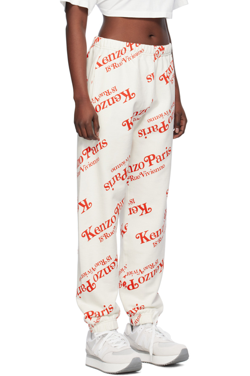 French terry sweatpants. Logo graphic printed throughout.

· Concealed drawstring at elasticized waistband
· Three-pocket styling
· Elasticized cuffs

Part of the Kenzo x Verdy collaboration.

Supplier color: Off-white