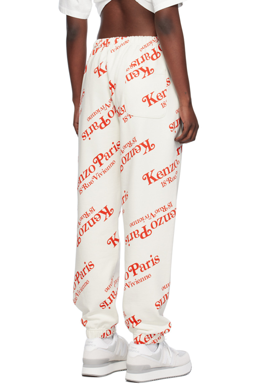 French terry sweatpants. Logo graphic printed throughout.

· Concealed drawstring at elasticized waistband
· Three-pocket styling
· Elasticized cuffs

Part of the Kenzo x Verdy collaboration.

Supplier color: Off-white