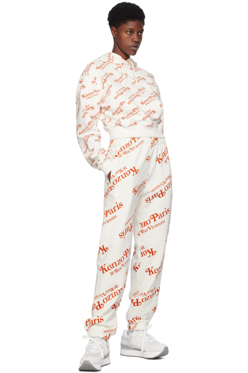 French terry sweatpants. Logo graphic printed throughout.

· Concealed drawstring at elasticized waistband
· Three-pocket styling
· Elasticized cuffs

Part of the Kenzo x Verdy collaboration.

Supplier color: Off-white
