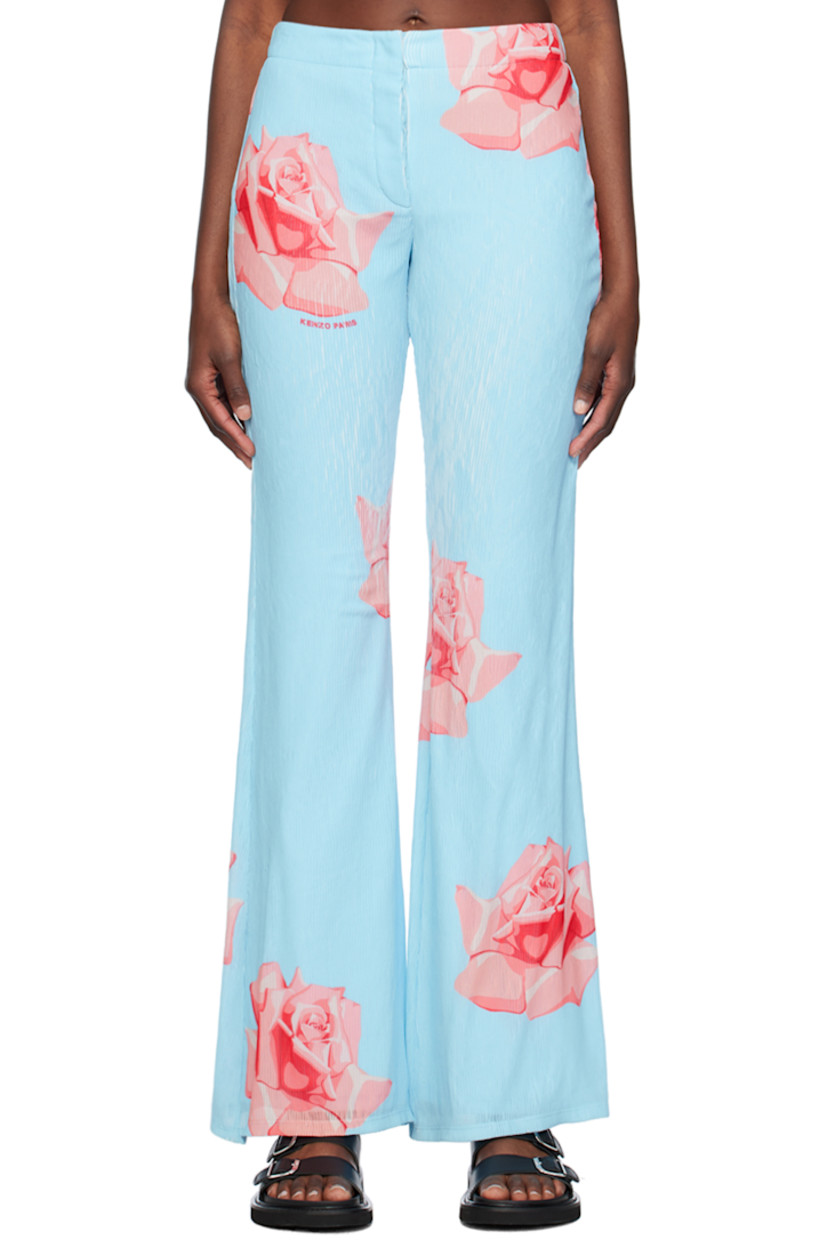 Flared polyester gauze pants. Floral graphics and logo printed throughout.

· Button-fly
· Full cotton jersey lining

Supplier color: Light blue