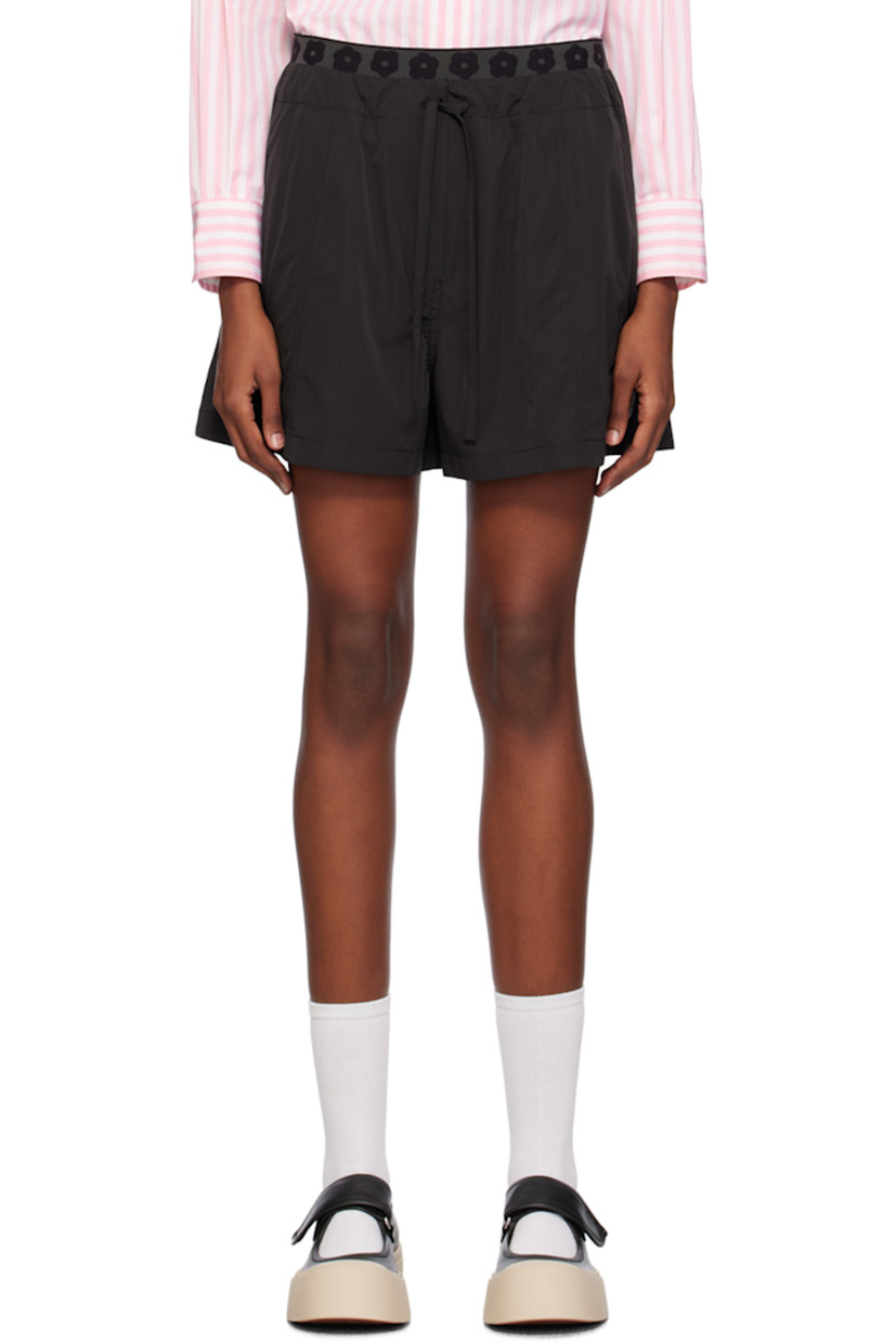 Polyester- and cotton-blend taffeta shorts.

· Floral graphics woven at elasticized waistband
· Drawstring at waist
· Two-pocket styling
· Mock-fly
· Embroidered logo graphic patch at front

Supplier color: Black