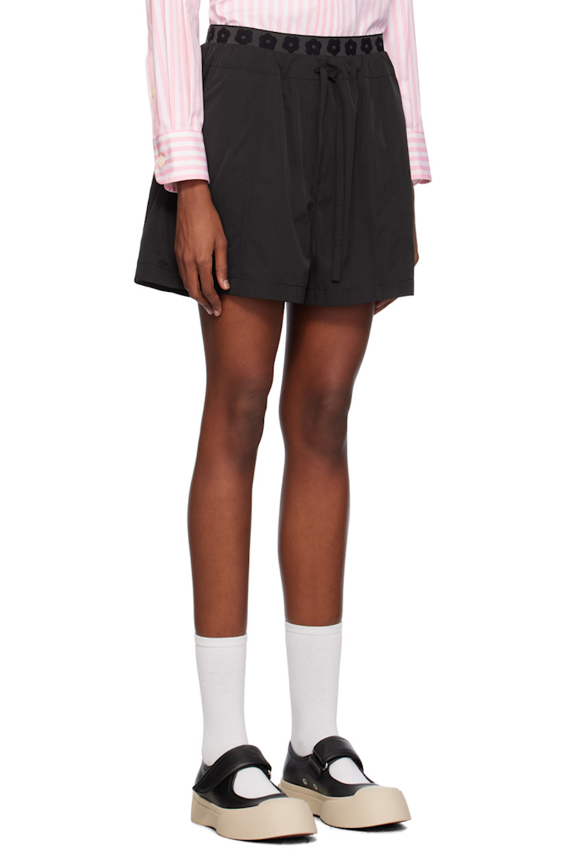 Polyester- and cotton-blend taffeta shorts.

· Floral graphics woven at elasticized waistband
· Drawstring at waist
· Two-pocket styling
· Mock-fly
· Embroidered logo graphic patch at front

Supplier color: Black