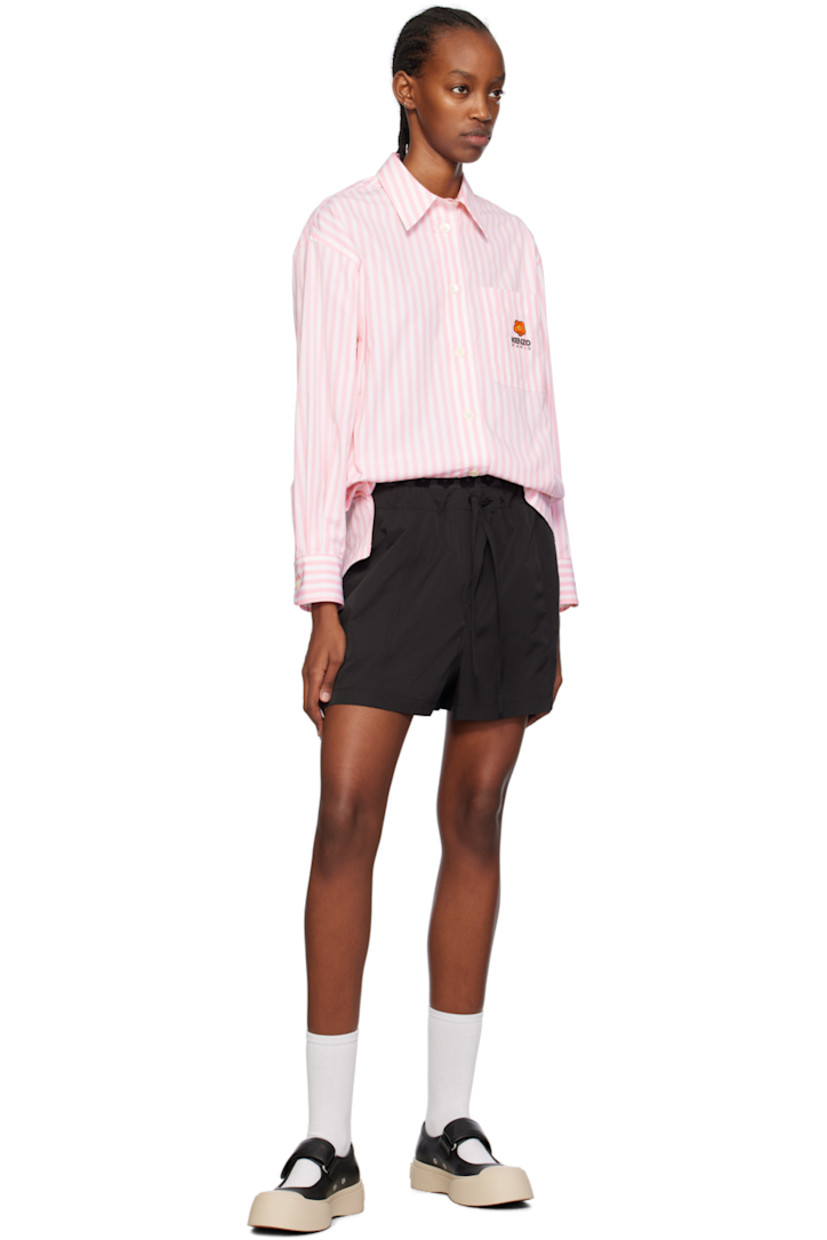Polyester- and cotton-blend taffeta shorts.

· Floral graphics woven at elasticized waistband
· Drawstring at waist
· Two-pocket styling
· Mock-fly
· Embroidered logo graphic patch at front

Supplier color: Black