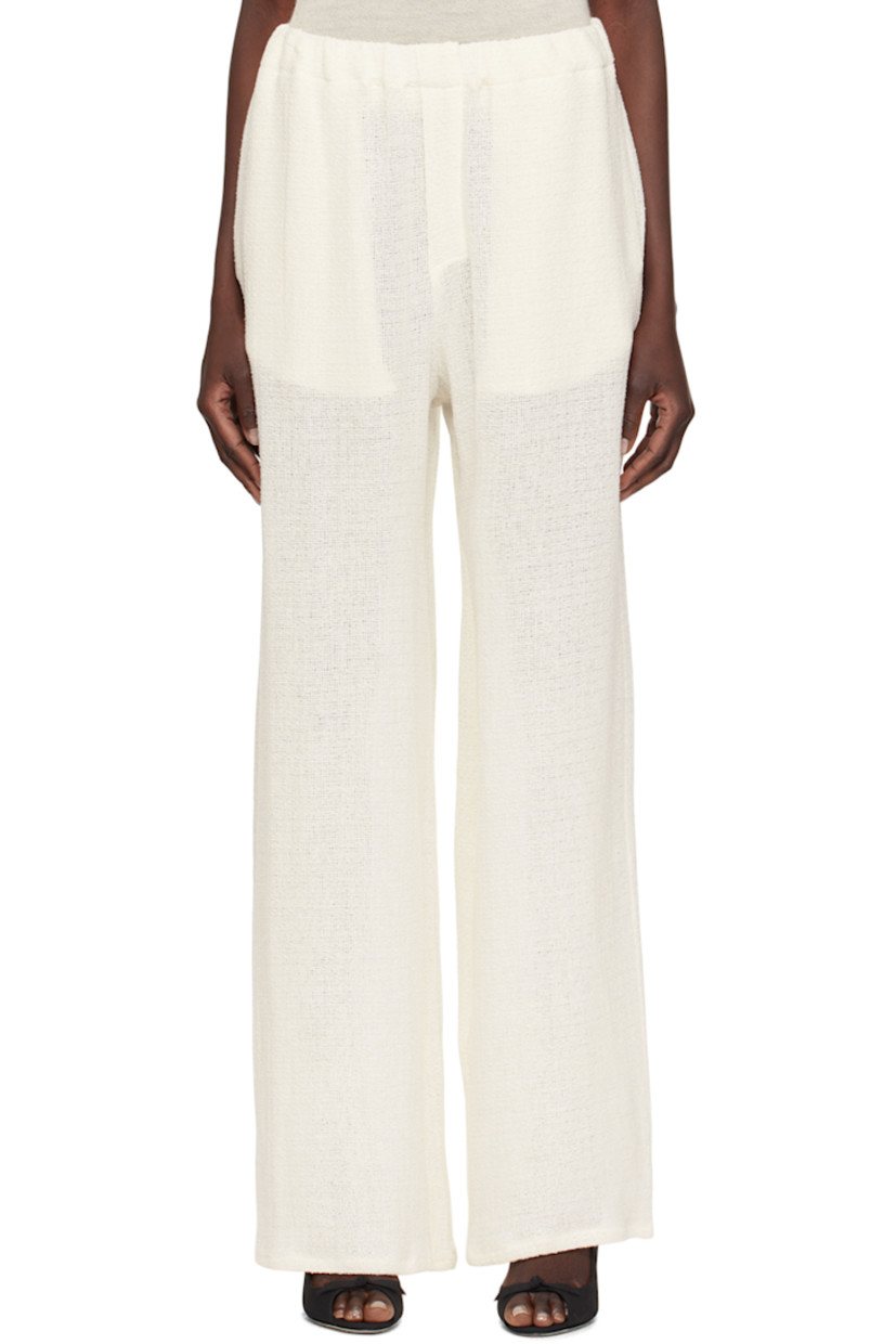 Linen- and rayon-blend tweed trousers.

· Elasticized waistband
· Two-pocket styling
· Mock-fly

Supplier color: Sand beige