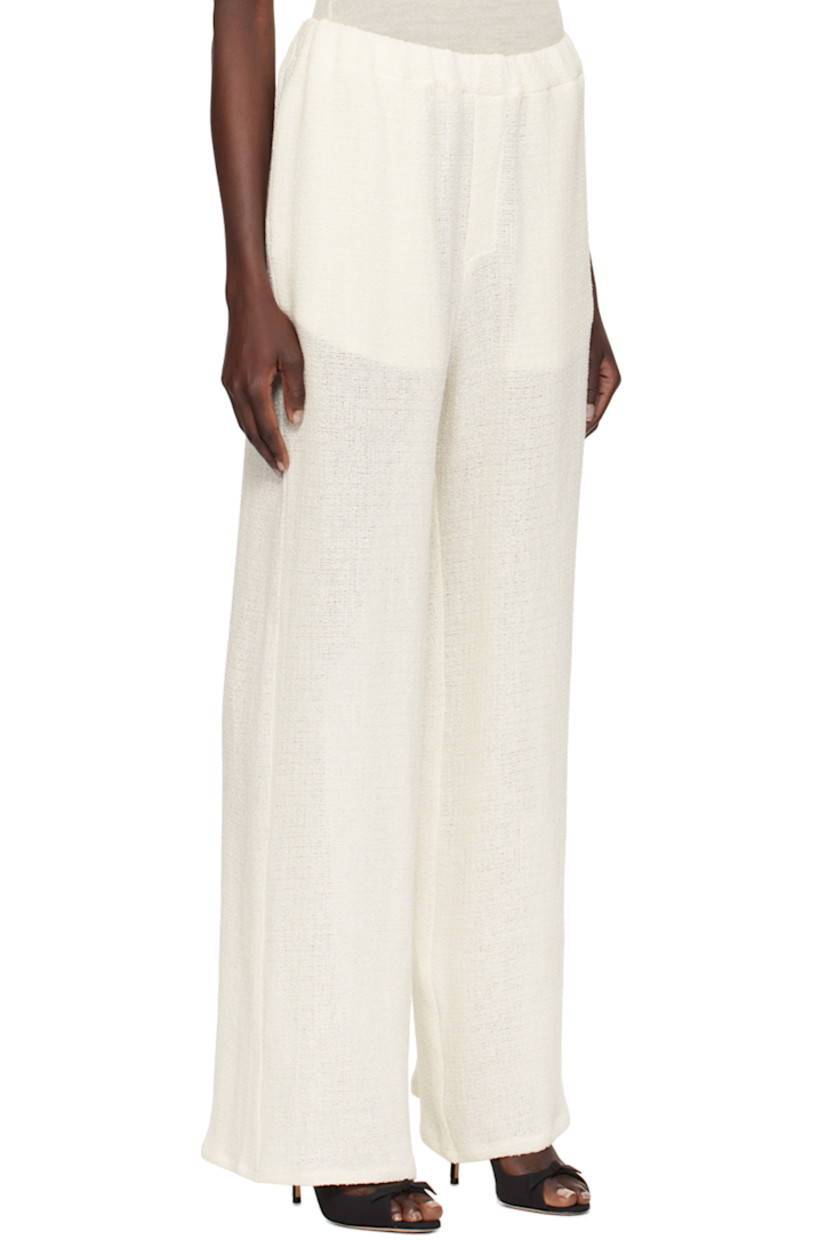 Linen- and rayon-blend tweed trousers.

· Elasticized waistband
· Two-pocket styling
· Mock-fly

Supplier color: Sand beige