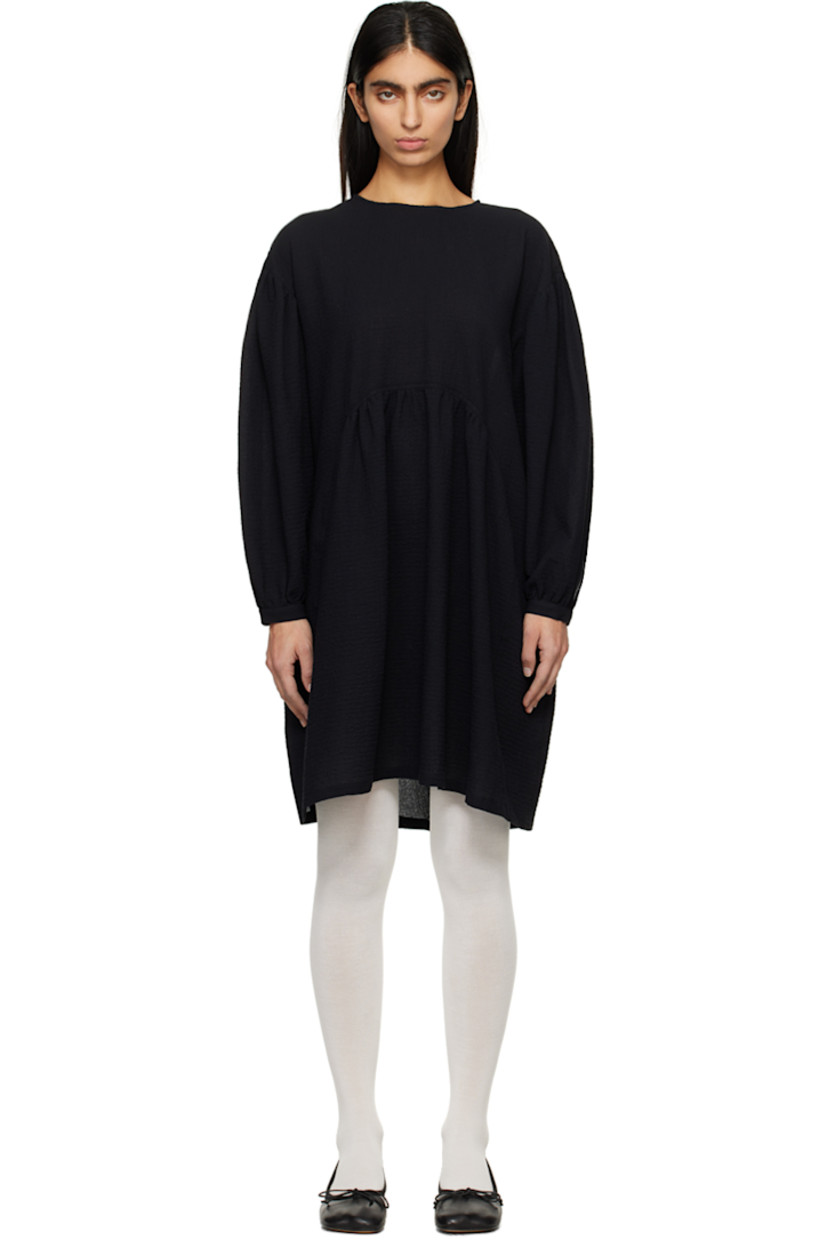 Stretch cotton cloqué dress.

· Crewneck
· Gathering at waist
· Seam pockets 
· Dropped shoulders
· Balloon sleeves 
· Single-button barrel cuffs
· Button fastening and keyhole at back collar
· Corozo hardware

Supplier color: Black