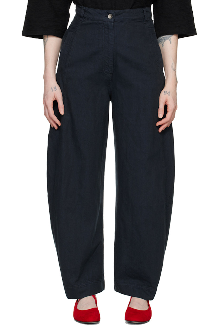 Non-stretch recycled cotton and recycled polyester-blend denim jeans.

· High-rise
· Belt loops
· Four-pocket styling 
· Zip-fly
· Button fastening at cuffs

Supplier color: Navy blue twill