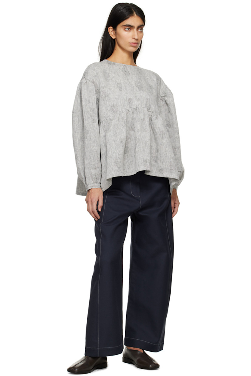 Wide-leg organic cotton twill trousers.

· High-rise
· Belt loops
· Three-pocket styling
· Zip-fly
· Corozo hardware
· Contrast stitching in white

Supplier color: Navy/Off-white