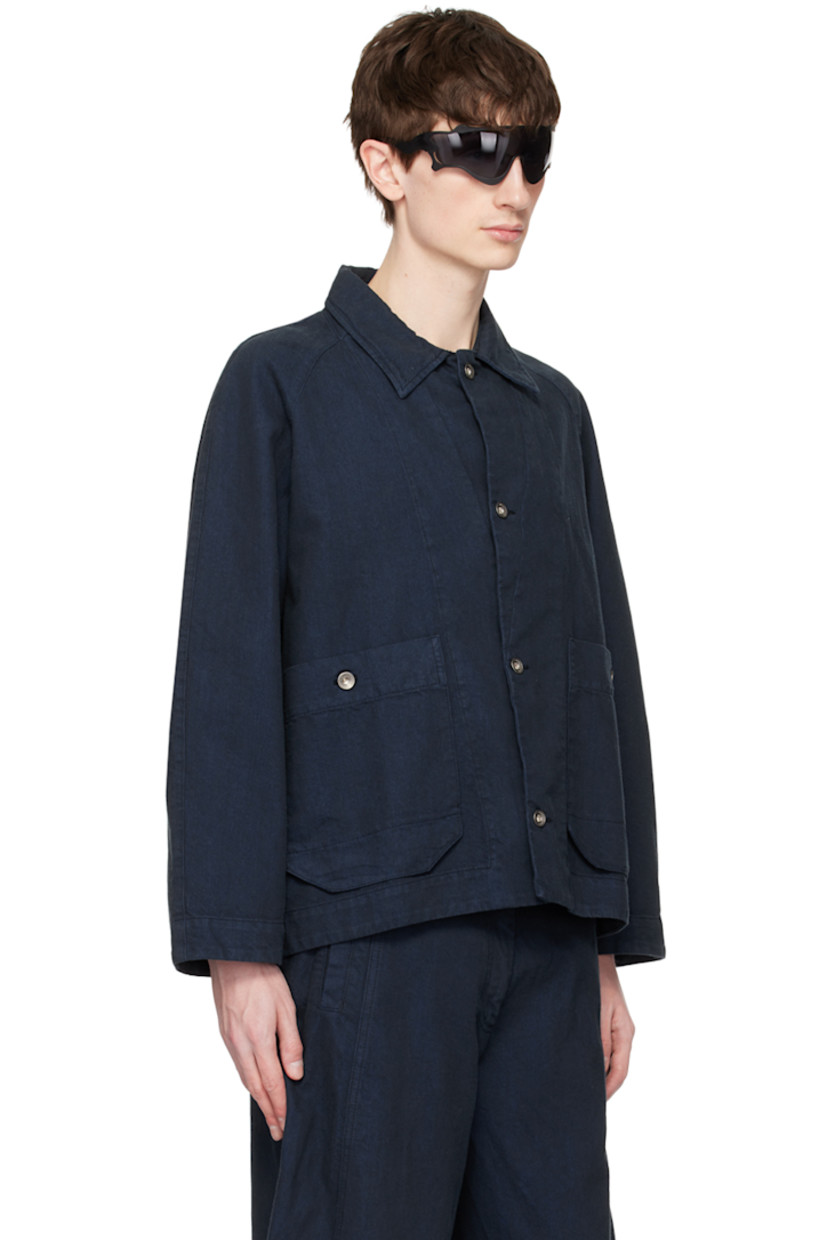 Non-stretch recycled cotton-blend denim jacket.

· Spread collar
· Button closure 
· Patch pockets
· Raglan sleeves
· Storm flap at back 
· Logo-engraved silver-tone hardware

Supplier color: Navy blue twill