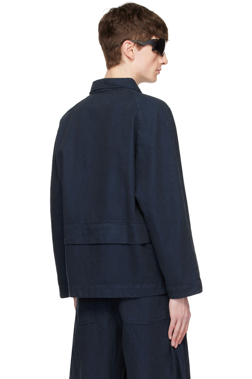 Non-stretch recycled cotton-blend denim jacket.

· Spread collar
· Button closure 
· Patch pockets
· Raglan sleeves
· Storm flap at back 
· Logo-engraved silver-tone hardware

Supplier color: Navy blue twill