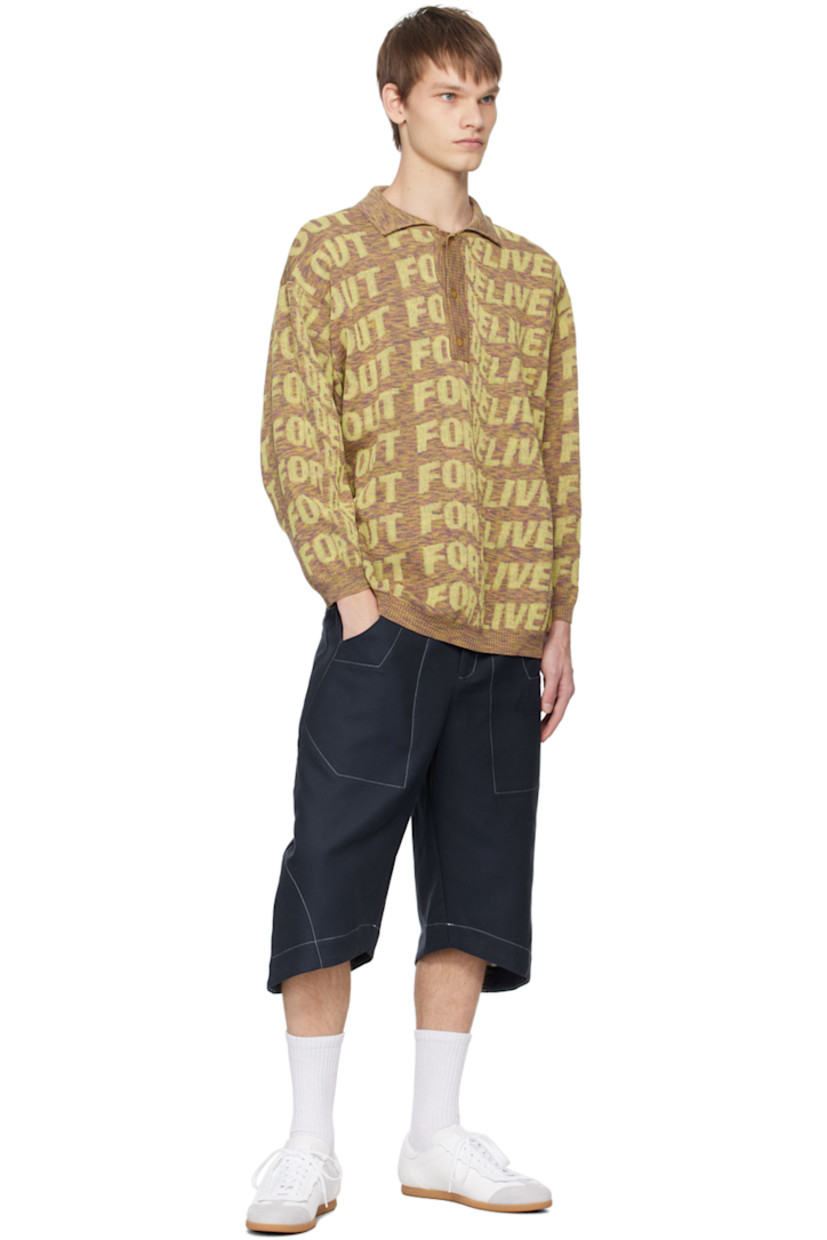 Knit cotton-blend polo. Jacquard text throughout.

· Rib knit spread collar, hem, and cuffs
· Three-button placket
· Corozo hardware

Supplier color: Yellow melange