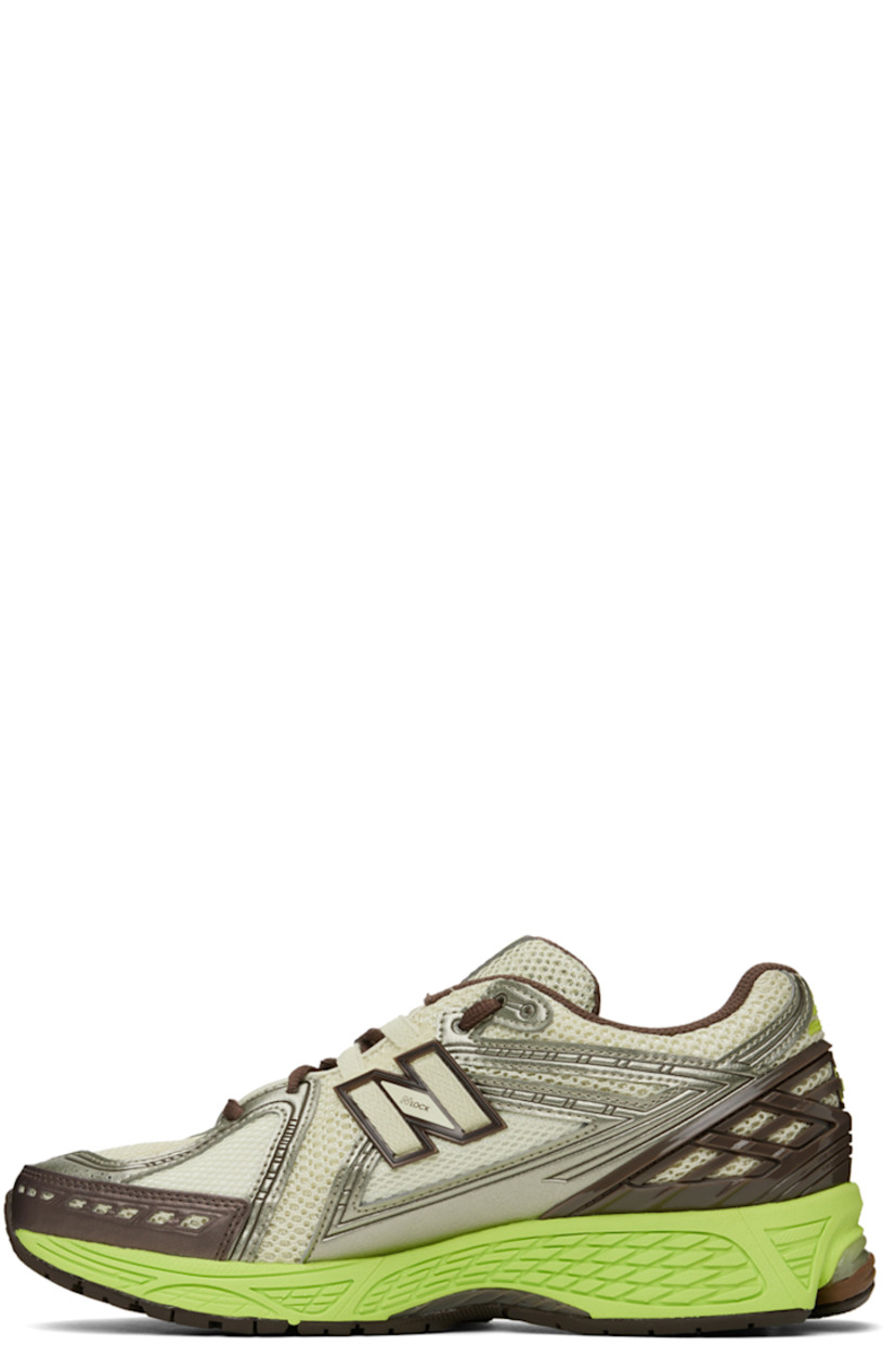 Low-top paneled mesh and buffed faux-leather sneakers in green, brown, and silver-tone. Alternate laces included.

· Lace-up closure
· Padded tongue and collar
· Rubberized logo appliqué at sides
· Logo-embossed rubber trim at heel counter 
· Mesh lining
· ABZORB foam rubber midsole
· Stability Web at treaded N-ergy rubber outsole

Part of the SSENSE XX exclusive offering.

Supplier color: Pistachio/Thirty watt
