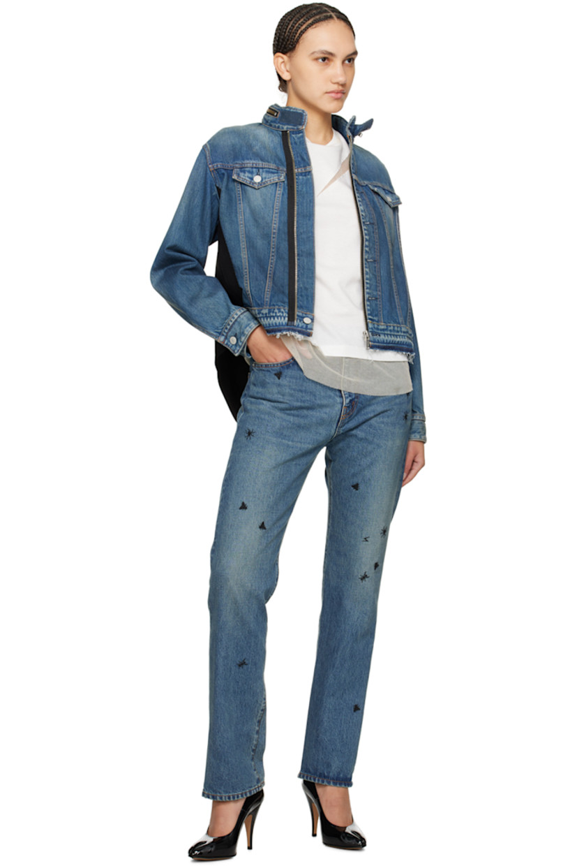 Non-stretch denim and wool twill jacket. Fading throughout. 

· Paneled construction 
· Taffeta stowaway hood
· Velcro tab at band collar
· Zip closure
· Flap pockets 
· Frayed edge at front hem
· Single-button barrel cuffs
· Button tabs at asymmetric back hem
· Unlined
· Logo-engraved silver-tone hardware 
· Contrast stitching in tan

Supplier color: Indigo
