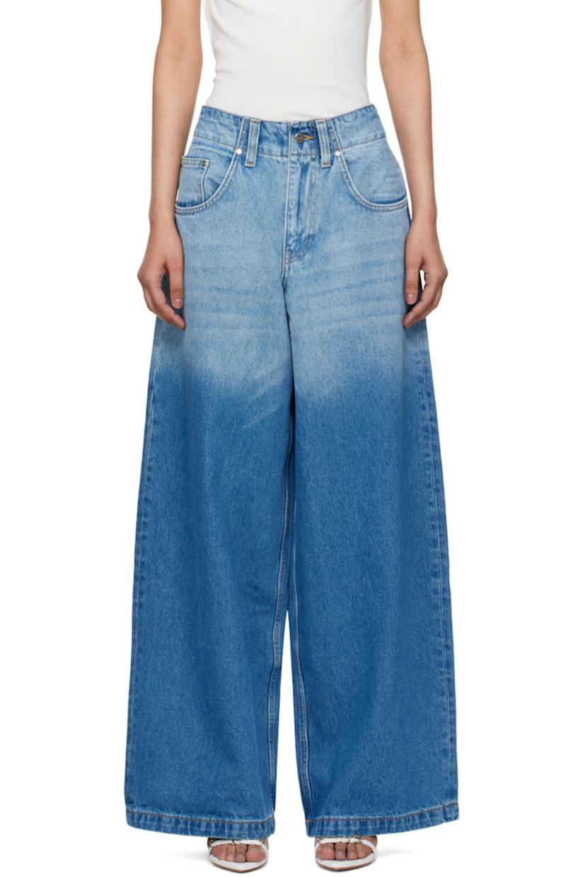 Baggy-fit wide-leg stone-washed non-stretch denim jeans. Gradient fading throughout.

· Belt loops
· Five-pocket styling
· Zip-fly
· Logo plaque at back waistband
· Mock patch pockets and rivets at back

Supplier color: American blue