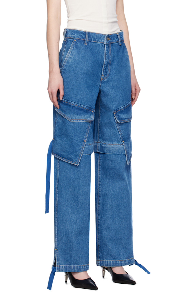 Relaxed-fit straight-leg non-stretch denim jeans. Fading throughout.

· Belt loops and concealed drawstring at waistband
· Four-pocket styling
· Zip-fly
· Detachable panel at legs
· Drawstring at vented cuffs
· Cargo pocket at outseams
· Leather logo patch at back waistband
· Contrast stitching in tan

Supplier color: American blue