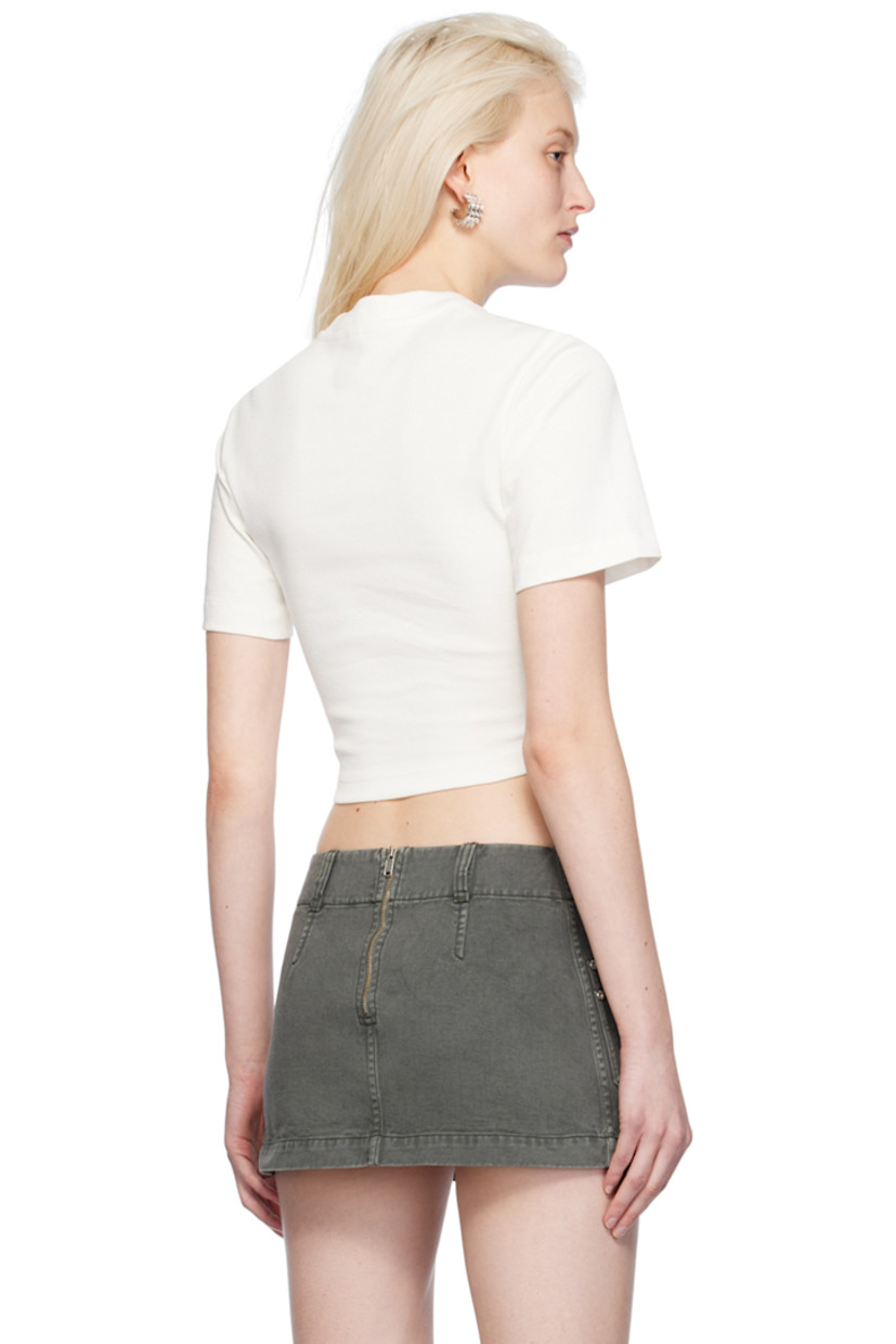 Organic cotton jersey T-shirt.

· Rib knit crewneck
· Utility pocket and rivets at front
· Boning at front
· Asymmetric hem
· Logo-engraved silver-tone hardware

Supplier color: Ivory
