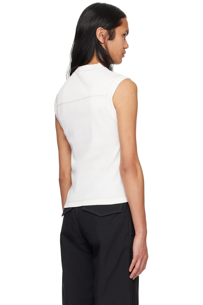 Organic cotton ribbed jersey tank top. Overlock stitching throughout.

·  Rib knit crewneck, armscyes, and back yoke
·  Logo graphic printed at chest

Supplier color: Ivory