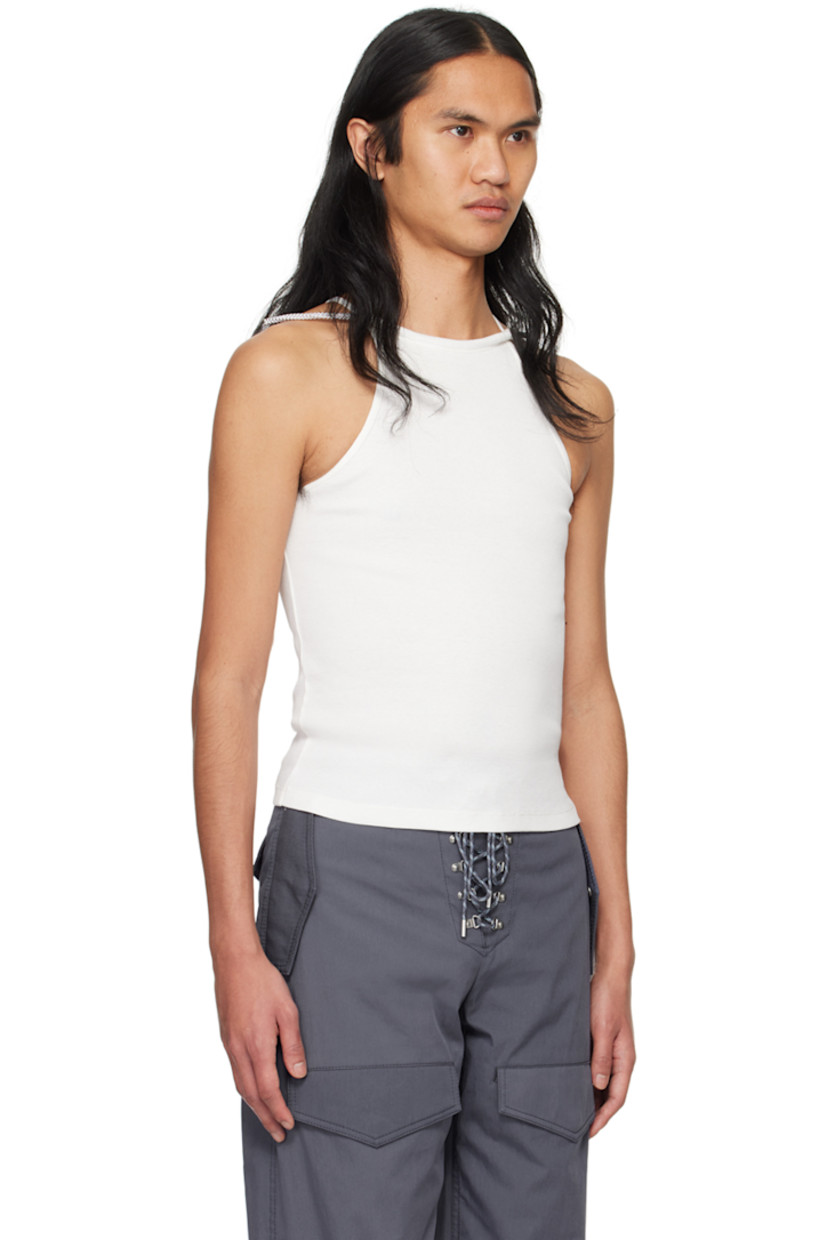 Organic cotton ribbed jersey tank top.

· Crewneck
· Detachable self-tie braided ball-chain halter strap
· Spaghetti straps
· Racerback

Supplier color: Ivory