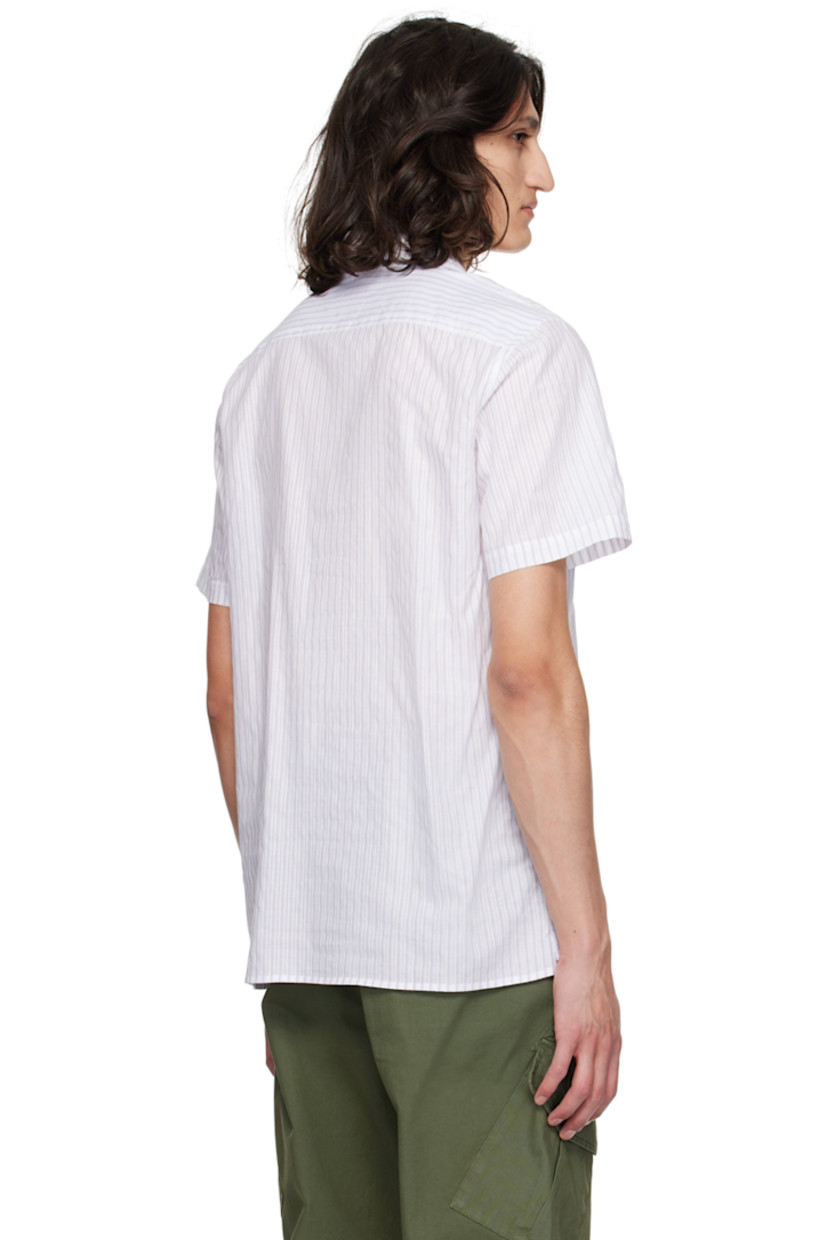 Plain-woven cotton shirt. Stripes and laddering throughout. 

· Button tab at open spread collar
· Button closure
· Tennis-tail hem
· Logo flag at side seam

Supplier color: Whites