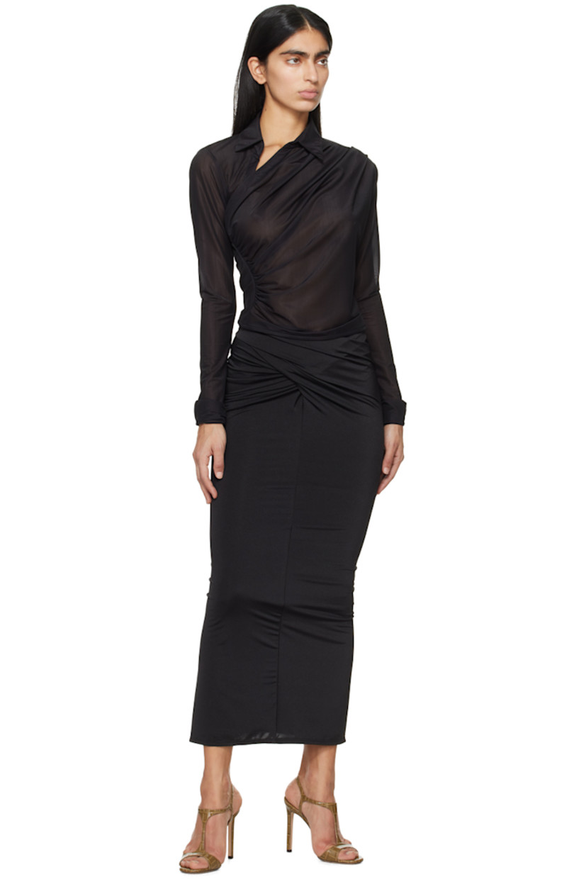 Stretch polyester jersey skirt. 

· Gathering at asymmetric waistband
· Central vent at back hem
· Fully lined

Supplier color: Black